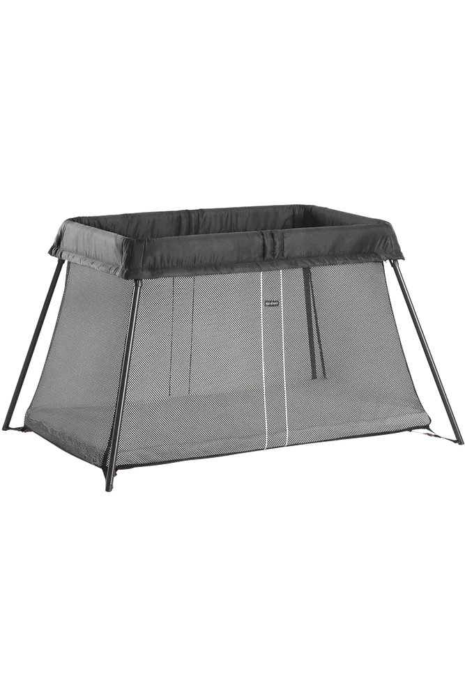 Complete Black BabyBjorn Travel Crib Light with outward-angled legs