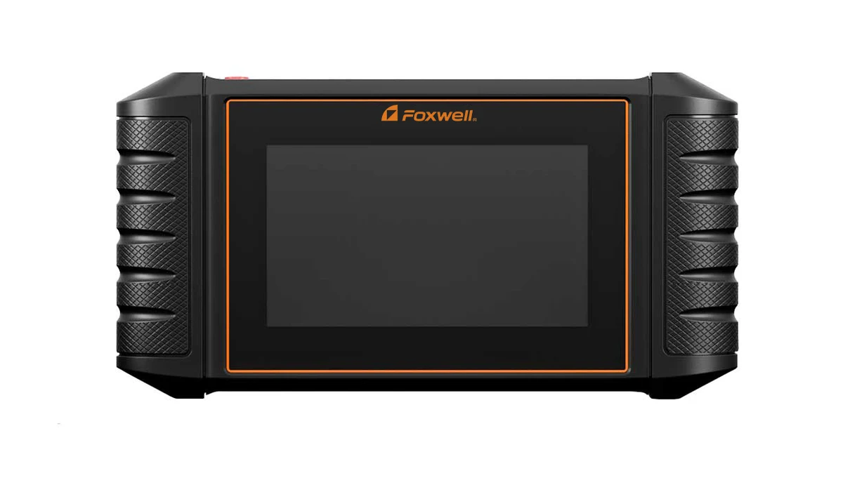 FOXWELL NT710 tablet with a black screen and orange FOXWELL branding