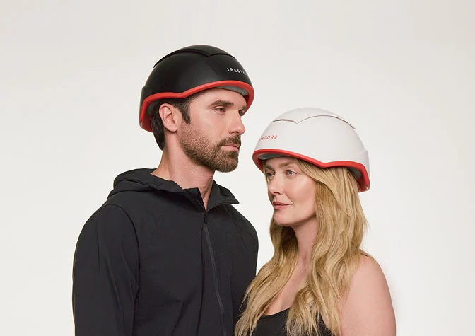 Woman wearing the white iRestore Illumina LED face mask