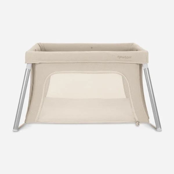 Newton Compact travel crib in Sand with mesh enclosure
